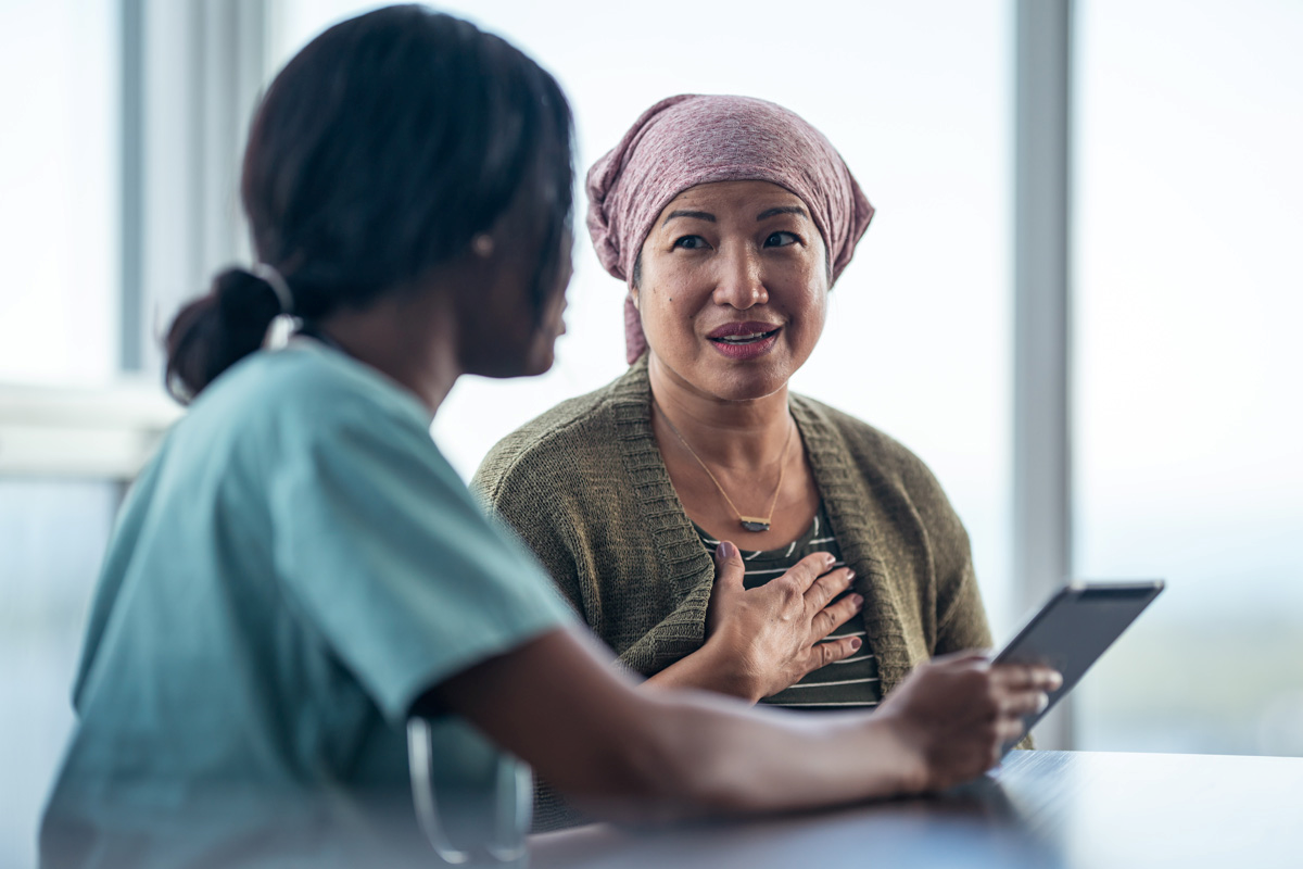 clinician consults with patient