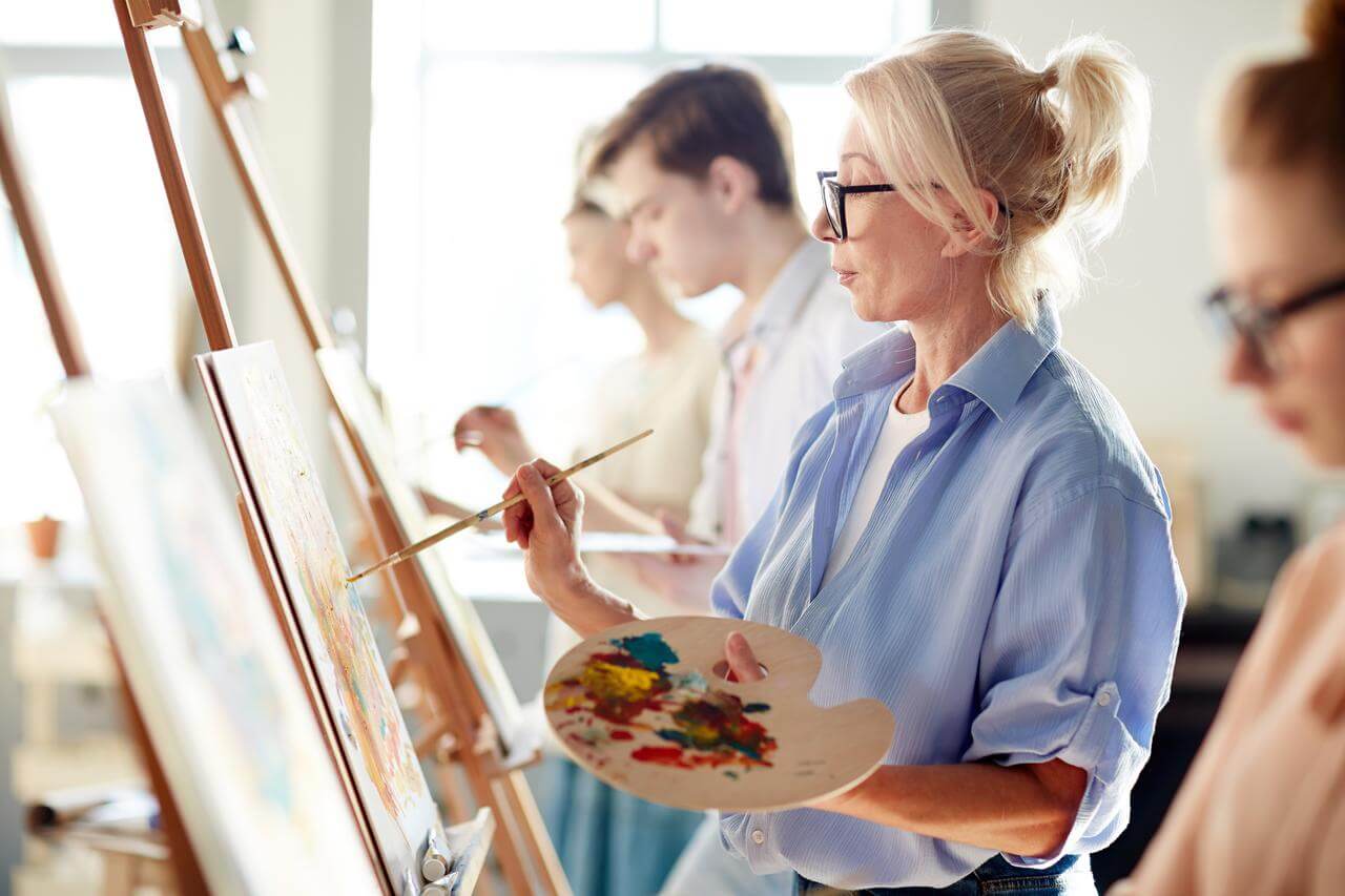 woman working on artwork